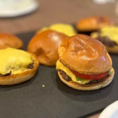Juicy smash burgers served on toasted brioche buns with melted cheese.