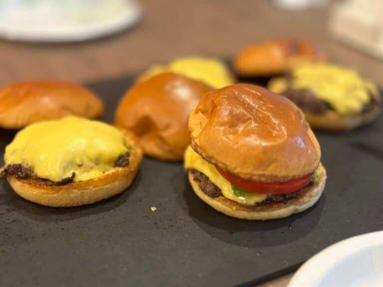 Juicy smash burgers served on toasted brioche buns with melted cheese.